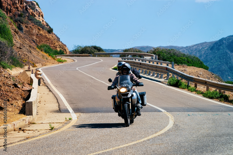 Motorcycles riding on a road